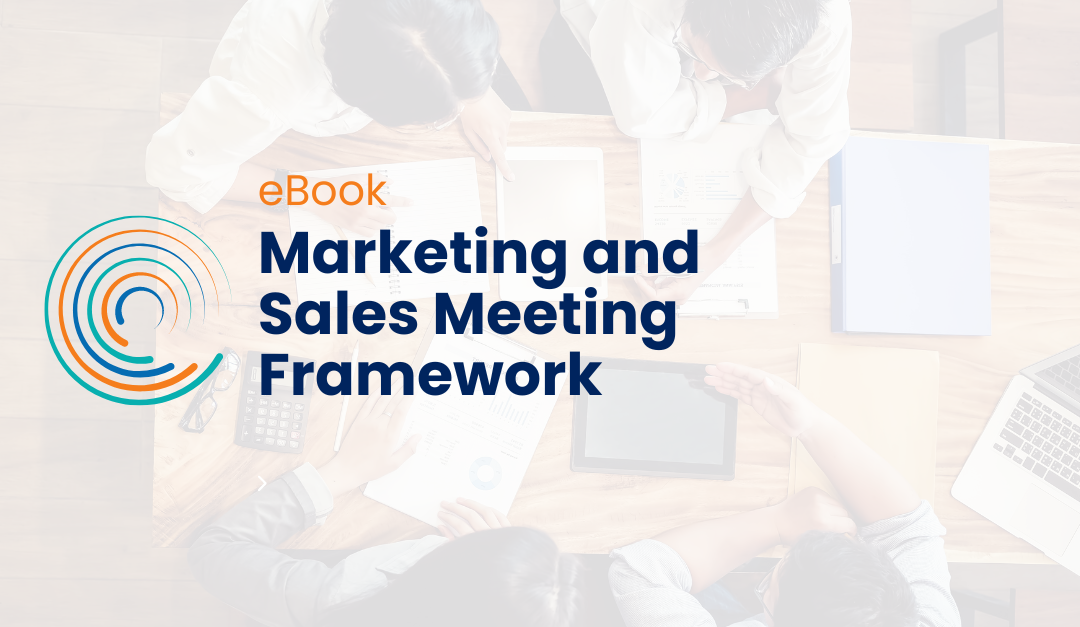Marketing and Sales Meeting Framework ebook _ full circle icon logo- people around a table having a meeting in background, shot from above, laptops and notebooks on table